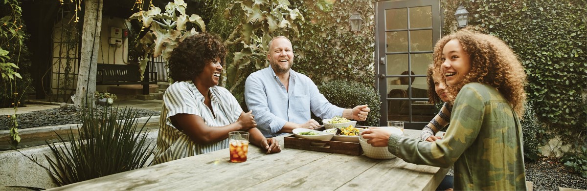 Family outside having dinner